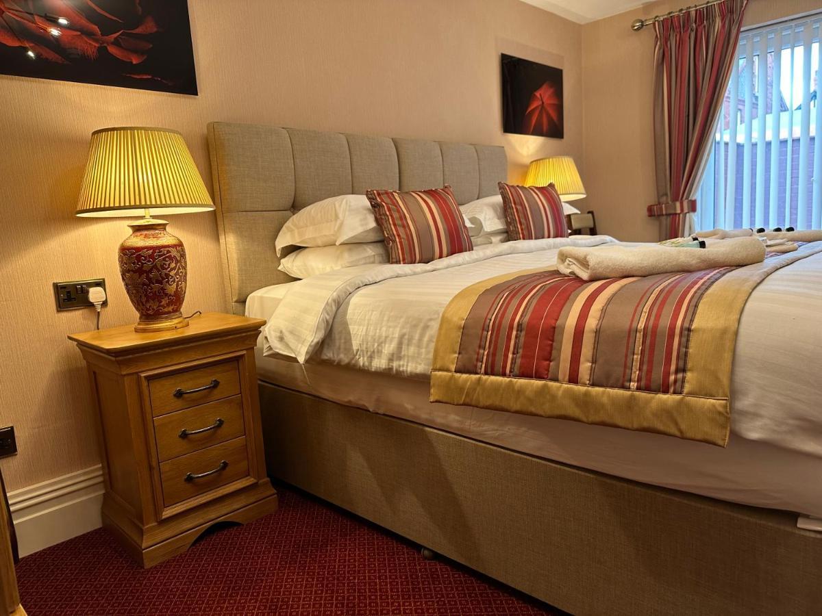 Chester House Guest House Exterior foto A bedroom at the hotel