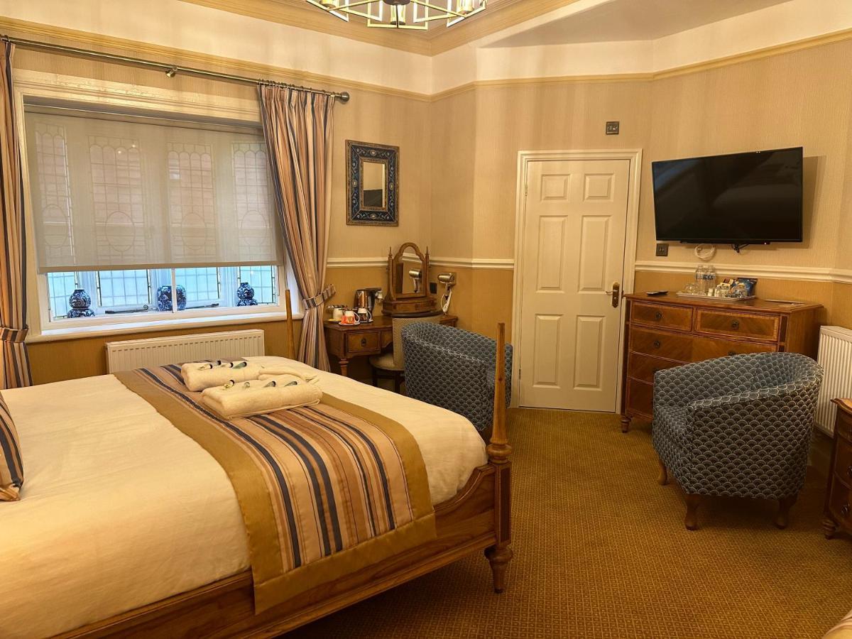 Chester House Guest House Exterior foto A bedroom at the hotel
