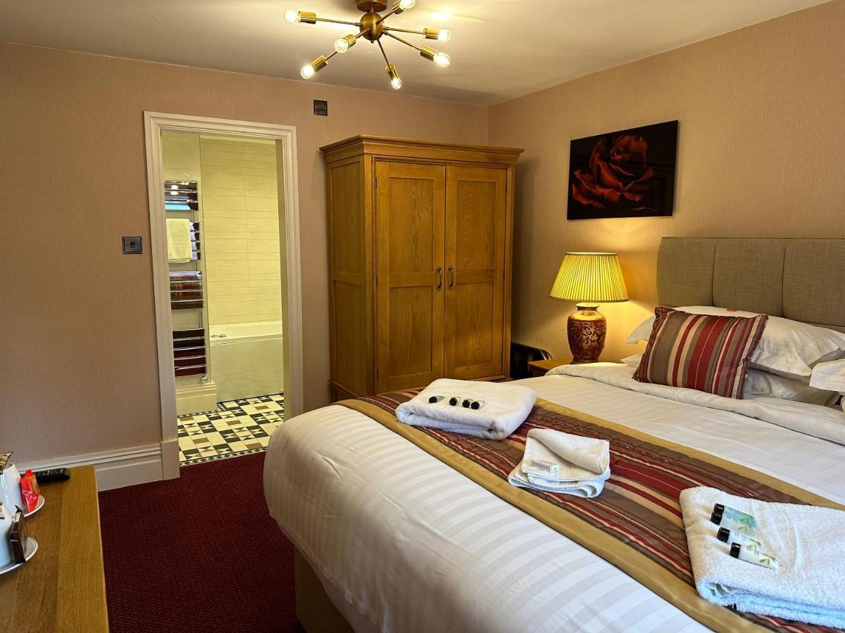 Chester House Guest House Exterior foto A bedroom at the hotel